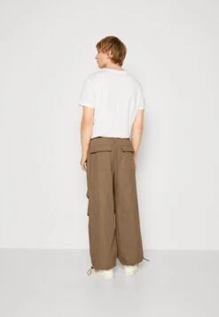 YOURTURN Unisex - Trousers - Brown -Clothing Sale Store 17dcbbd1abb24daba15398d62a26705d